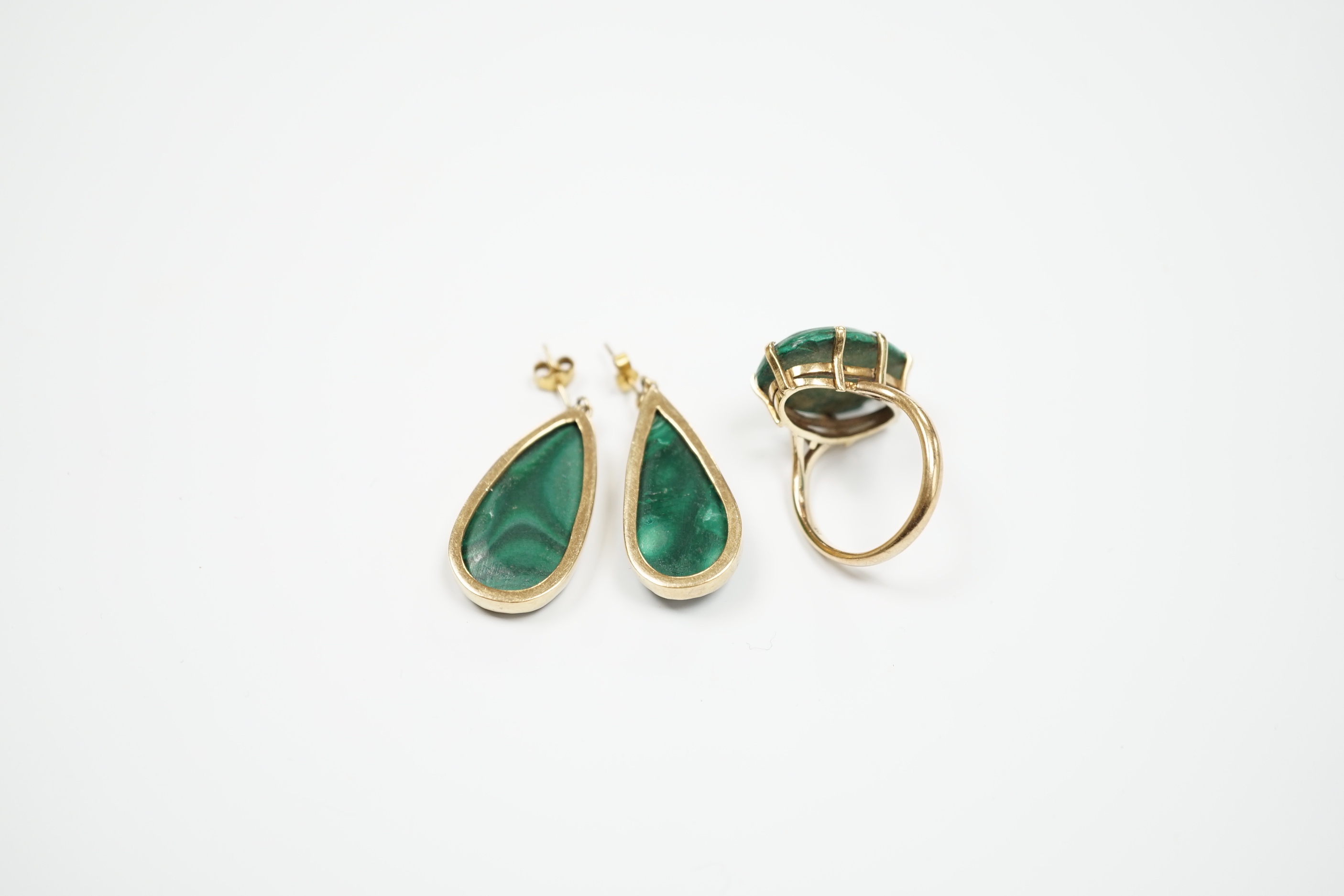A 9ct and oval cut malachite set dress ring and pair of matching drop earrings, ring size P, gross weight 20.1 grams.